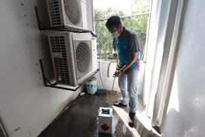 Checking refrigerant gas level office aircon